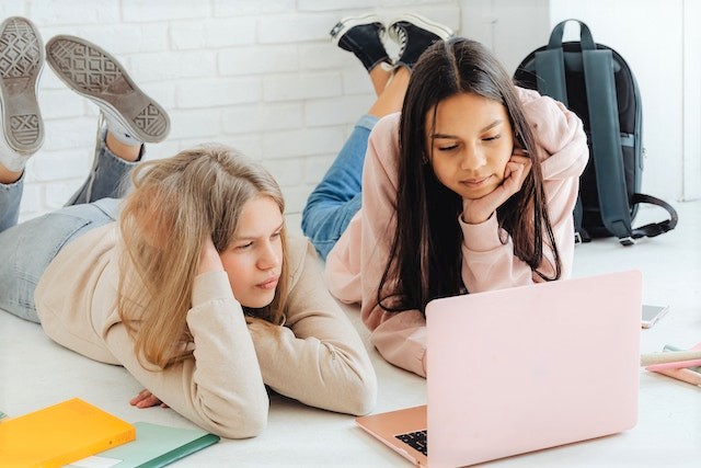 Teen girls with laptop