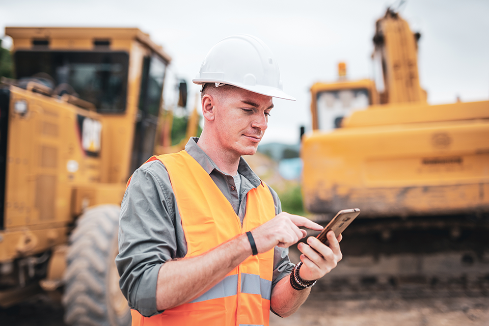 constuction worker on phone- designated savings