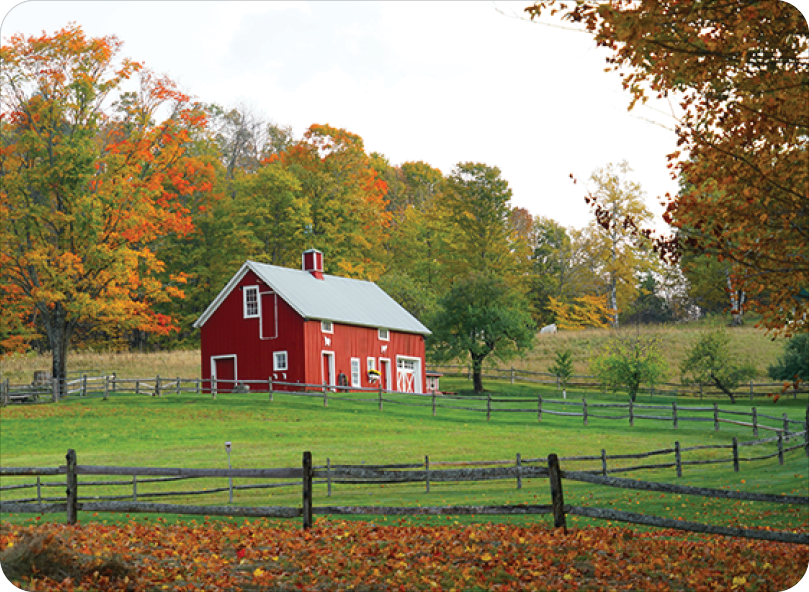 farmhouse and farmland in autumn
