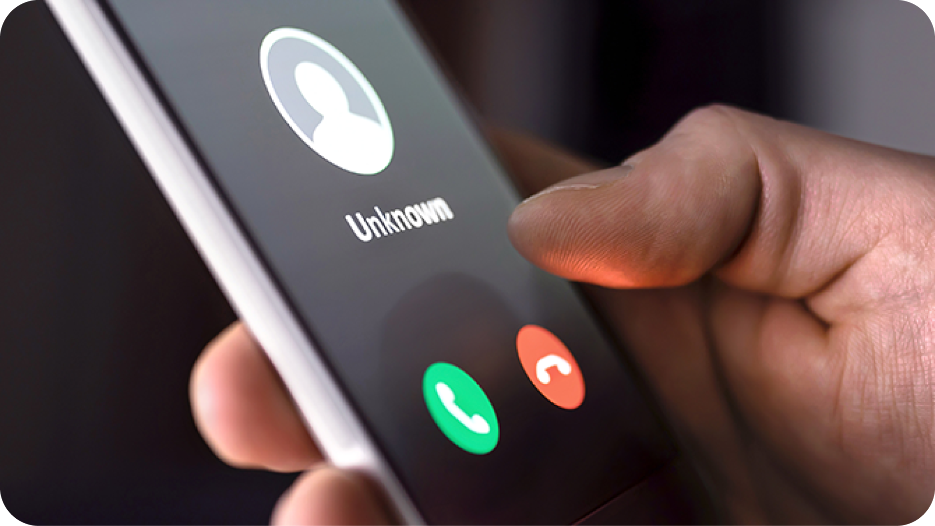 hand holding smart phone with unknown caller popped up