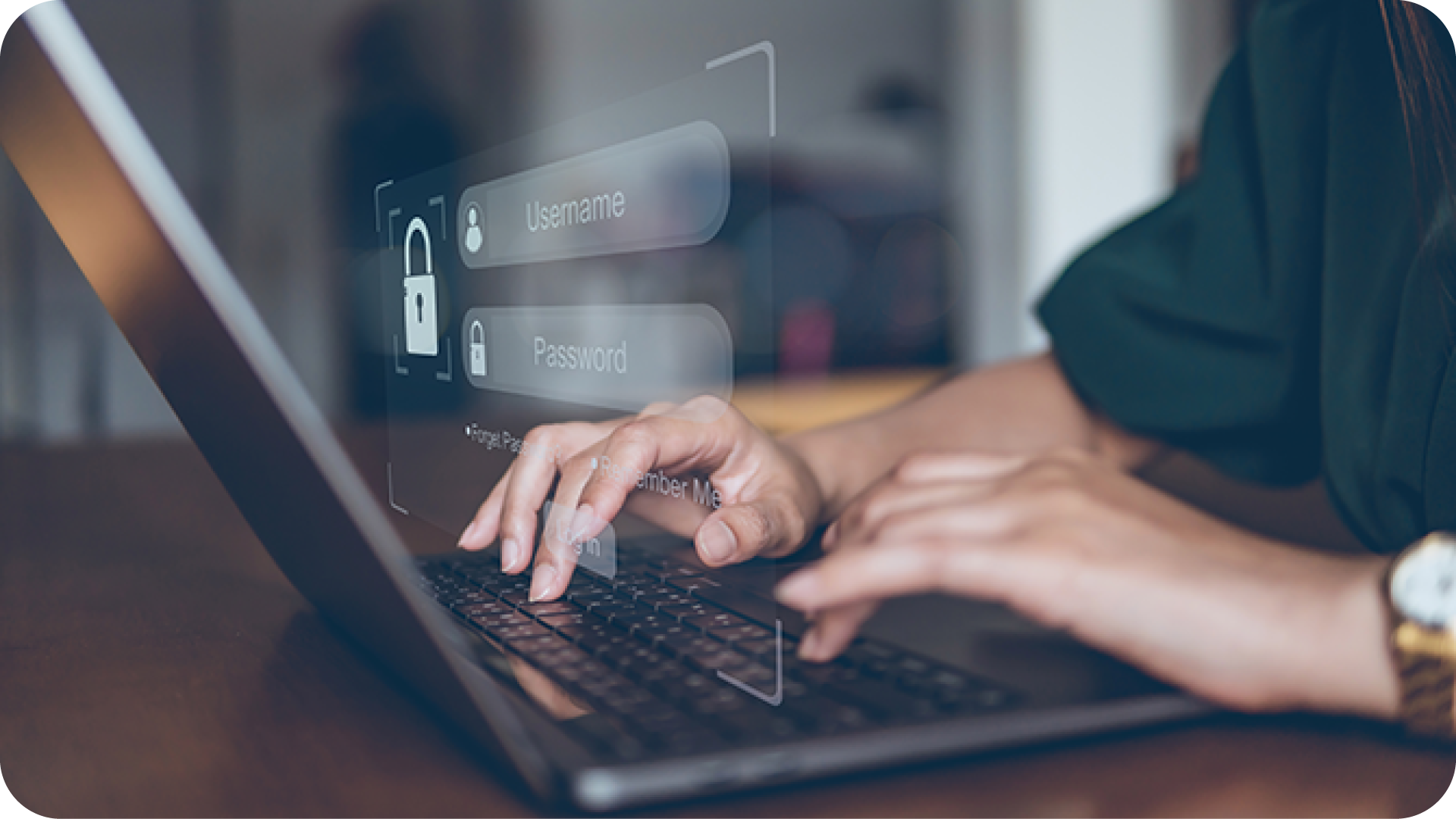 hands on laptop keyboard entering username and password