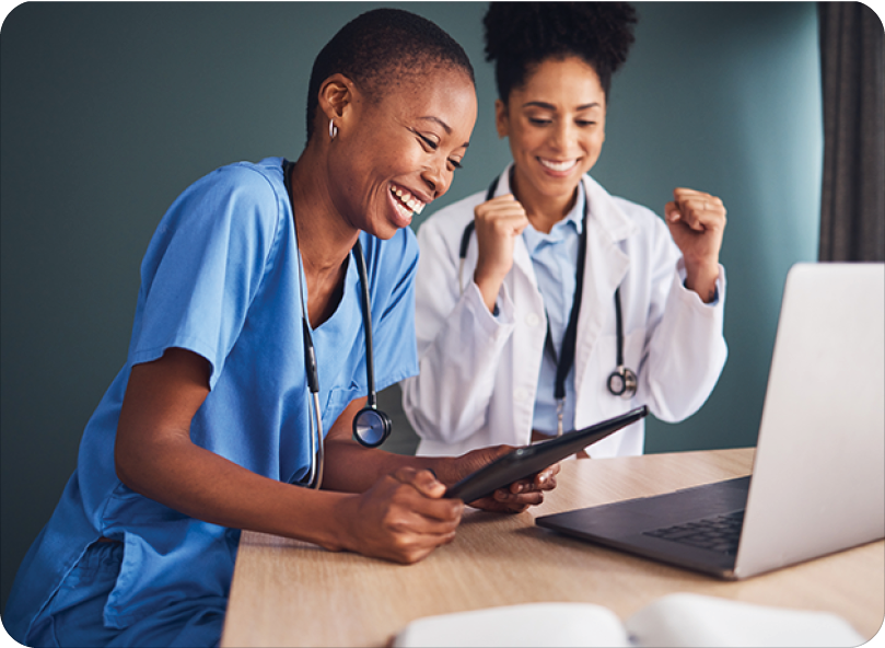 Medical nurse and doctor smiling and celebrating