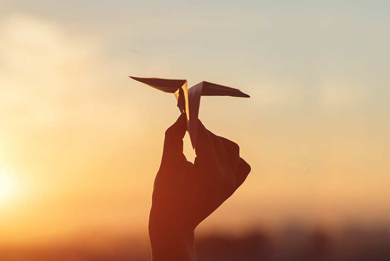 origami bird in sunset