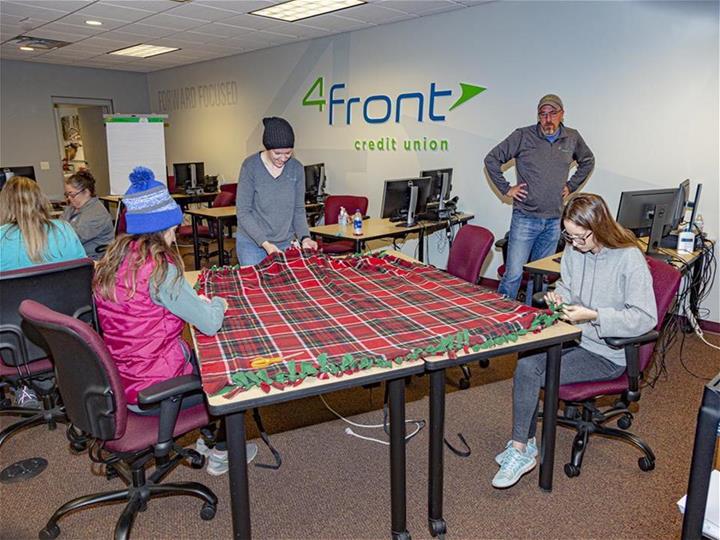 4front Credit Union staff making blankets